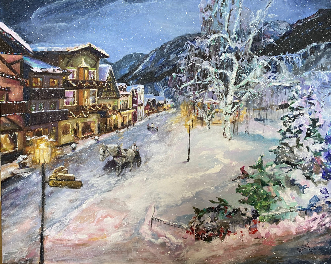 A winter wonderland scene by Nena Howell depicting a snowy Leavenworth village illuminated with holiday lights. Families enjoy horse-drawn carriage rides and collect cozy memories.